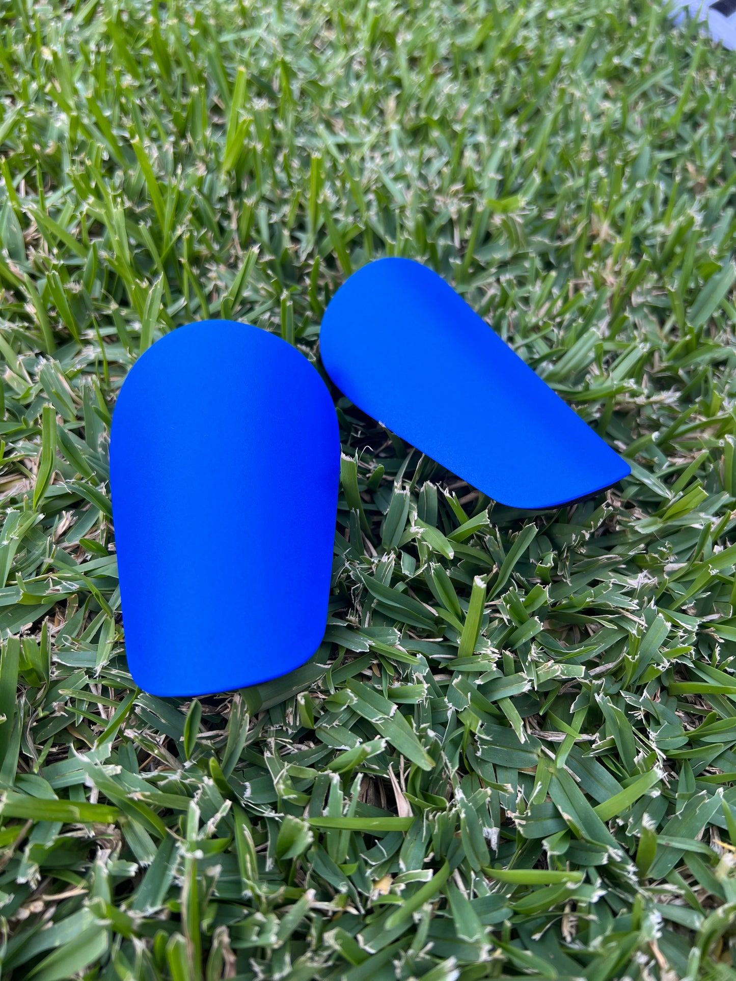 Mini protège-tibias bleus