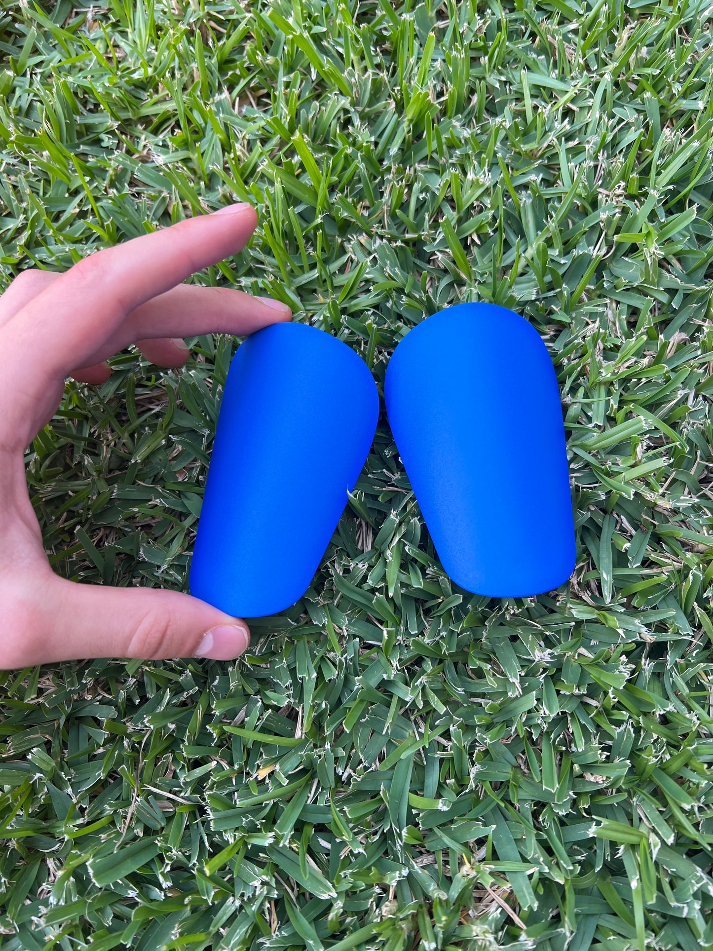 Mini protège-tibias bleus