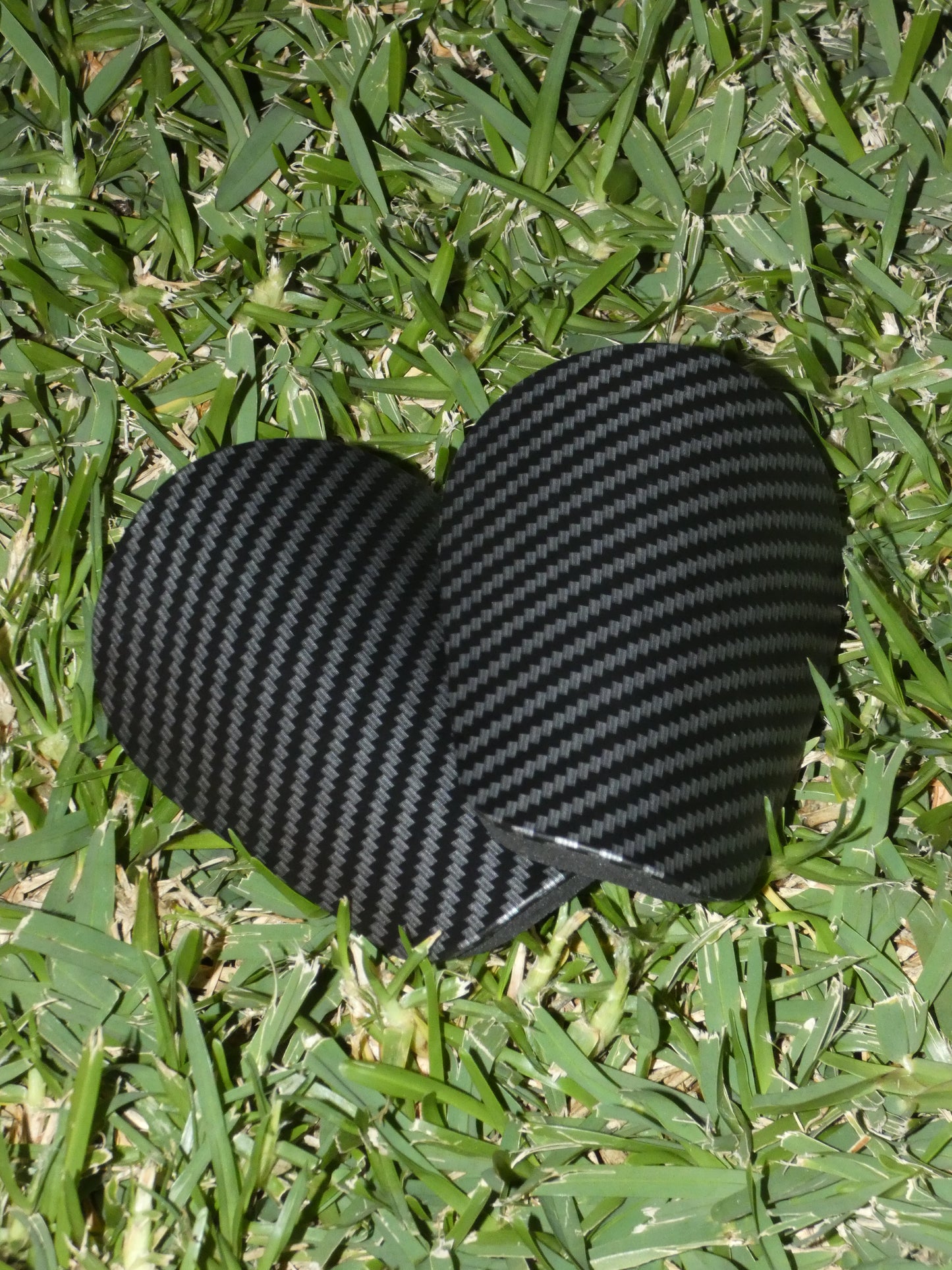 Mini protège-tibias en fibre de carbone